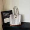 Bolsa de lona de poliéster y algodón de gran capacidad, simple y resistente, nuevo diseño de moda 2026, bolso de hombro texturizado con letras en relieve