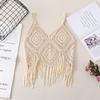 Top bohemio de ganchillo con tirantes con flecos, sin espalda y sin mangas, ideal para vacaciones.