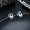 Nuevos aretes de ojo de diablo de acero de titanio transfronterizos para hombre, aretes de diseño de nicho de lujo ligero de alta gama, accesorios de moda para mujer