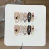Tao Xilv [Kadiaoxingluo] Diseño de Temperamento Brillo Dorado Fino Corazón Puntos Estrella Tallado Hecho a Mano Uñas Portátiles