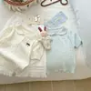 Camisa de punto de estilo preppy de moda con cuello polo, top versátil para el verano, versión coreana, camisa de punto de moda para niños