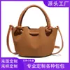 Bolso de un solo hombro, bolso cruzado, bolso de gamuza de moda, bolso tipo cubo con acabado mate, bolso versátil de alta gama para mujer, personalizado de fábrica