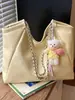 Bolsa de Hombro Grande de Lona de Nuevo Estilo Verano 2026 Transfronteriza Versátil con Cadena Estilo Suave para Estudiante Clase para Mujer