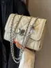 Bolso de cadena acolchado estilo Chanel para mujer, nuevo bolso cruzado mini de moda versátil 2026, bolso cuadrado pequeño popular