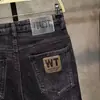 Jeans negros elásticos de primavera para hombre, marca de moda, nuevos pantalones ajustados skinny para primavera y otoño 2006, pantalones largos finos de verano