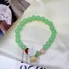 Novo bracelete de ágata imitação de jade para mulheres, com um pingente de vagem de lótus fresco e simples e contas em disco, um presente para amigas e estudantes
