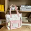 Mochila de novo estilo para meninas, na cor azul, com design estiloso, múltiplos compartimentos, adequada para alunos do ensino fundamental das séries 3-5, um conjunto de duas peças e o moderno estilo "pain bag".
