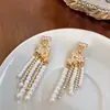 Pendientes vintage de borlas y perlas estilo francés, collar exquisito de moda de nicho de alta gama, conjunto de joyería versátil de lujo ligero para mujer