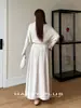Ropa Tallas Grandes para Mujer Runqi busca nuevos suéteres 9615 cuello alto suave cintura plisada manga murciélago