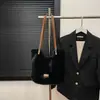 2026 Nuevo Estilo Coreano Gran Capacidad Moda para Viajar Bolso de Hombro Único Diseño de Nicho Retro Bolso de Mano Simple de Felpa