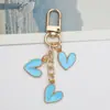 Chaveiro Pingente Novo Amor da Amazon Pingente Menina Doce Fofo Liga de Metal com Gotejamento de Óleo Chaveiro Acessórios para Bolsa