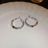 Pendientes de anillo liso transfronterizos europeos y americanos con aguja de plata, pendientes de nicho de viento frío, pendientes de temperamento de moda, lujo ligero, sentido de alta gama