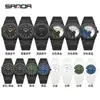 Reloj Creativo Sanda Bicolor 50m Resistente al Agua Calendario Simple Números Árabes Reloj de Cuarzo Unisex Popular Transfronterizo