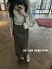 Falda Corta de Mujer Shenzhen Nanyou Falda Recta de Cuero de Cintura Alta con Abertura para Mujer Longitud Media Temperamento de Oficina Dos Colores