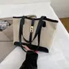 Bolsa de Mão Fashion para o Trabalho para Mulheres Outono e Inverno 2025 Nova Bolsa de Ombro Versátil de Grande Capacidade Bolsa Tote de Temperamento Spliced