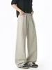 Pantalones largos casuales de corte holgado en gris avena para hombre, pantalones versátiles de pierna recta para otoño, pantalones deportivos retro americanos con una caída moderna