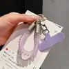 Cable de teléfono elástico colorido cordón para teléfono móvil muñeca llavero corto bolsa colgante resistente anti-pérdida estilo ins nuevo