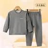 Pijama Térmico de Fleece Infantil Outono e Inverno Lã Seda Sem Costura Conjunto de Top e Calça para Meninos e Meninas Roupa Íntima Espessa