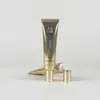 Embalagem de bisnaga cosmética de alumínio plástico dourado creme para os olhos creme isolante base loção líquida ponta rolha interna frasco