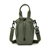 Bolsa para teléfono móvil de mujer 2026 nuevo estilo casual japonesa y coreana bolsa tipo cubo gran capacidad un solo hombro bandolera cordón mochila pequeña