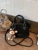 Bolsa de Mão Nova Tendência Simples e Estilosa Bolsa Bowling para Mulheres Moda Retrô Bolsa de Ombro Versátil Bolsa Transversal para Mulheres