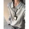 Camisa polo negra estilo americano, camiseta de manga larga de peso pesado para hombre para otoño con un cuello elegante, perfecta como capa base