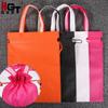 Bolsas de tela no tejida con cordón en stock, personalizables con logo, bolsas de mano elegantes y creativas