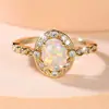 Rongxing Anel Retro Oval Dourado Sintético Opala Renda Oca Envolvendo Diamantes Anel de Noivado Feminino Levemente Luxuoso