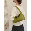 Bolso tejido de diseño de nicho de verano para mujer, nuevo modelo 2026, versátil para el trabajo, bolso de un solo hombro para llevar debajo del brazo, bolso de mano pequeño para salir