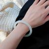Librito rojo con patio de bambú verde de vidrio imitación Jade pulsera redonda pulsera gruesa con cascabel ropa Han antigua una generación de cabello