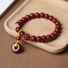 Venta al por mayor de fábrica pulsera de un solo círculo imitación cinabrio étnico hebilla de paz valiente colgante de múltiples estilos pulsera de cinabrio exquisita