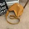 Bolsa de Ombro Único Artística Juvenil para Mulheres, Bolsa Transversal de Cor Sólida Estilo Ins para Casais Moda Roupa de Trabalho, Bolsa Tendência Nicho Formato Bolinho para Homens