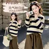 Conjunto de outfit de otoño para niñas 2026 nuevo estilo moderno suéter a rayas de moda y conjunto de pantalones de pierna ancha para niños mayores