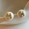 Acessórios de Orelha em Alta no Tiktok Estilo Ano Novo Brincos Vermelhos Personalizados Brincos da Moda Versáteis Tachos de Orelha Ganchos de Orelha Presilhas de Orelha para Mulheres