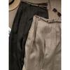 En Stock Directo de Fábrica Venta al por Mayor Pantalones de Lino Plisados de Color Sólido Pierna Ancha con Cinturón para Mujer