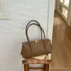 Bolso de mano retro europeo y americano Ruien para mujer 2026 nuevo estilo minimalista bolso de hombro para el día a día bolso de lujo ligero para debajo del brazo