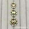 Botões metálicos vazados em formato de coração, tipo gota de óleo, para ternos, casacos de lã tricotados, botões decorativos simples e versáteis para costura à mão