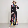 Traje plisado estampado estilo europeo y americano con cuello semi-alto, manga larga, cintura alta y falda larga de bajo amplio estampada para mujer