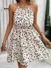 Vestido elegante de moda para mujer de estilo nuevo europeo y americano transfronterizo de Amazon con ceñidor en la cintura, corte A, cuello halter y estampado floral