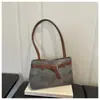 Comercio exterior transfronterizo gran capacidad retro 2026 cuero texturizado cinturón de viaje color sólido nuevo bolso de mano bandolera tote