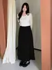 Saia Midi Ino Plus Size Cintura Alta Linha A para o Trabalho Cobrindo o Quadril Outono 2026 Nova Versátil Emagrecedora Comprimento Médio 315420