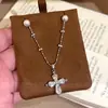 Colar com Pingente de Cruz de Zircônia com Contas de Pérola Design de Nicho Corrente para Clavícula Simples Fashion Versátil para Mulheres