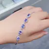 Pulsera de tanzanita natural ovalada tridimensional plata de ley 925 joyería de alta gama joyería mujeres al por mayor una generación de cabello