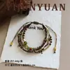 Pulsera Exquisita de Cuerda Roja Tejida a Mano con Forma de Calabaza, Estilo Retro Original, con un Toque de Lujo Ligero y Alta Gama, Joyería Versátil de Múltiples Capas para Mujeres