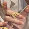 Novo colar chinês estilo dourado com borla de enrolamento de cobra, design de nicho, alta qualidade, sentimento, vida, ano, clavícula, corrente, novo estilo 2025