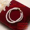 Conjunto de Pulseira e Colar de Pérolas de Água Doce Brancas de Camada Dupla para Meninas, Combinado com um Conjunto de Joias da Moda com Laço