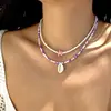 Collar Europeo y Americano Transfronterizo Ins Color Bohemio Cuentas de Arroz Colgante de Concha Collar de Perlas 2 Collares de Perlas Apilados en la Clavícula de Playa