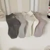 Calcetines retro de otoño e invierno con lazo floral suave para mujer, versátiles de media pantorrilla, sin costuras, modernos, de algodón, calcetines apilables para mujer