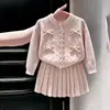 Conjunto de dos piezas de punto dulce color rosa con lazo para niñas, nuevo para otoño 2026, estilo coreano