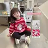 Sudadera de cuello redondo con dibujos animados para niñas, primavera y otoño de 2025, nueva camiseta informal coreana a rayas para niñas pequeñas